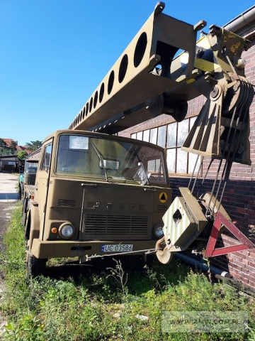 Żuraw samochodowy DS-0101R na samochodzie JELCZ 325 (zatarty silnik, udźwig 10 t) 