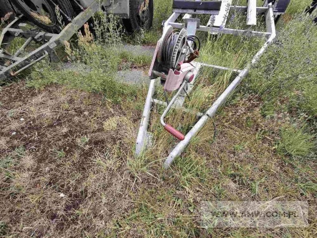 Przyczepa podłodziowa TRAMP TRAIL 1300JH ( 1-osiowa, ładowność 1000 kg, po kolizji, uszkodzona rama, boczne oświetlenie, zaczep, koło podporowe, mechanizm wyciągarki) 