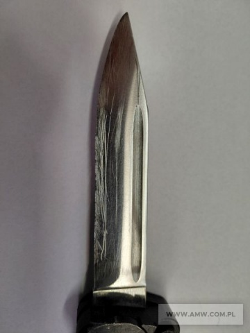 Asortyment służby uzbrojenia i mundurowej - pakiet zawierający 68 poz. asort. (wg oddzielnego wykazu), w tym m.in.: noże wz. 1969 - 6 szt. oraz oznaki stopni - 3 714 szt. (różne rodzaje) 