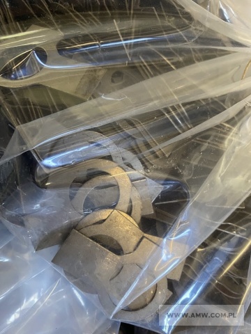 Materiały budowlane - pakiet zawierający 22 poz. asort. (wg oddzielnego wykazu), w tym m.in.: nakrętka M 8x1-5-B PN82144 - 6,932 kg. podkładki odginane różne - 55,15 kg. gwoździe budowlane różne                             - 11,85 kg itp. 