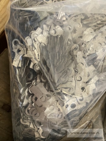 Materiały budowlane - pakiet zawierający 22 poz. asort. (wg oddzielnego wykazu), w tym m.in.: nakrętka M 8x1-5-B PN82144 - 6,932 kg. podkładki odginane różne - 55,15 kg. gwoździe budowlane różne                             - 11,85 kg itp. 