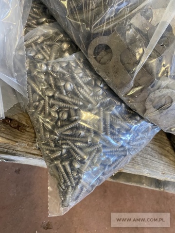 Materiały budowlane - pakiet zawierający 22 poz. asort. (wg oddzielnego wykazu), w tym m.in.: nakrętka M 8x1-5-B PN82144 - 6,932 kg. podkładki odginane różne - 55,15 kg. gwoździe budowlane różne                             - 11,85 kg itp. 