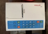 Urządzenia medyczne - pakiet zawierający 3 poz. asort., w tym: elektrokardiograf 1-kanałowy AS CARD - 1 szt.. elektrokardiograf CARDIOVIT AT-1 - kpl.. inhalator tlenowy - 1 kpl. 
